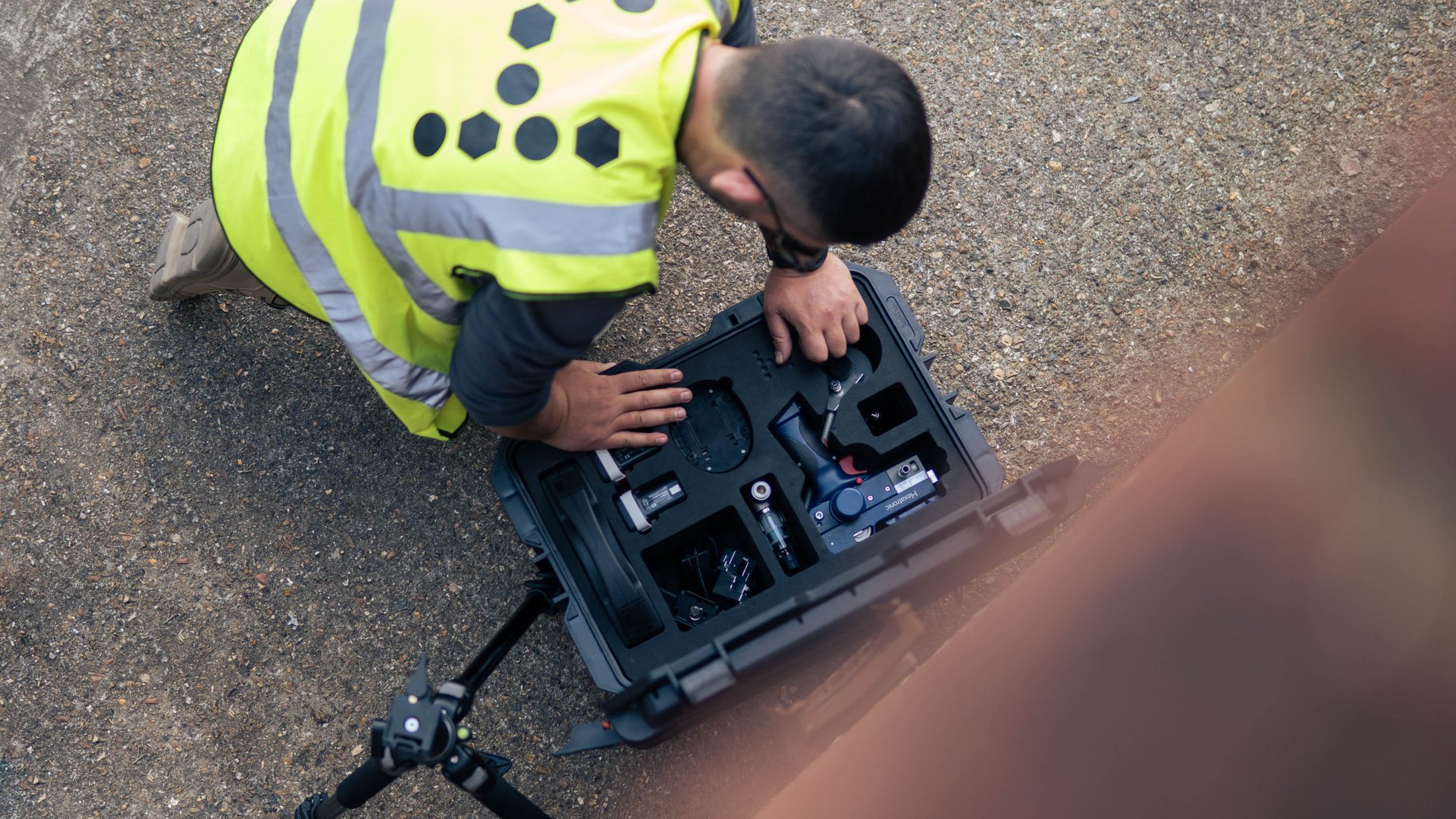 Field technician packing the ABF tool in its case.