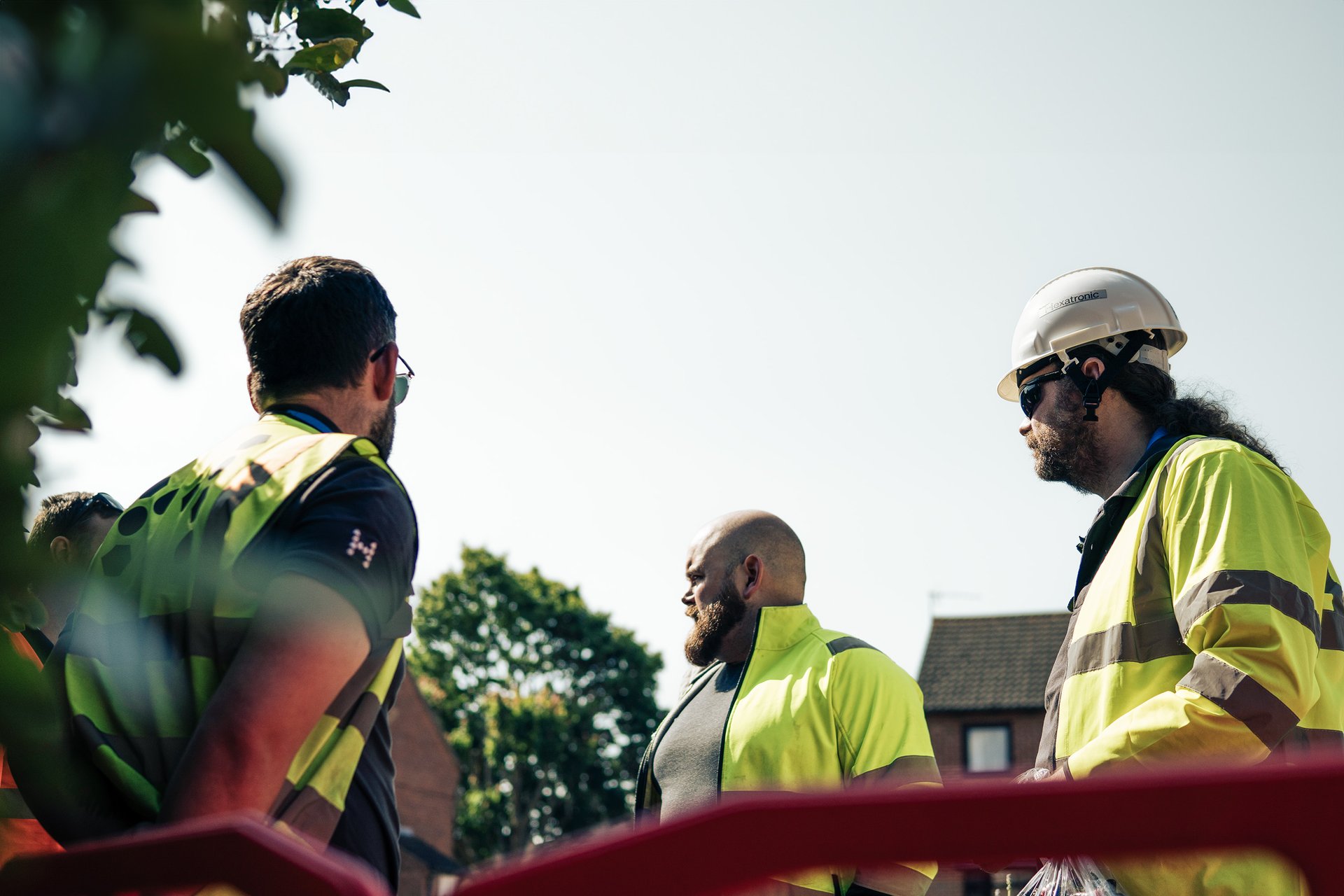 Fiber technicians surveying a residential area before the fiber deployment.