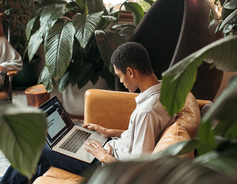 young-man-with-laptop