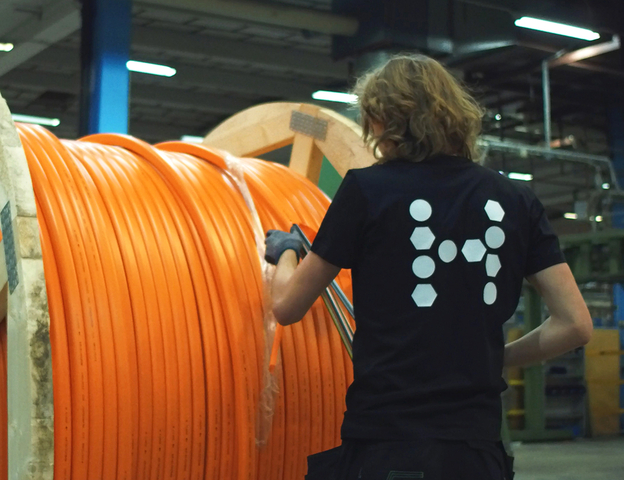 One Hexatronic employee in production