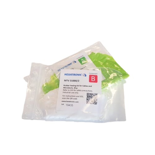 Light green and white rubber paste sealing kit in two separate, small plastic zip bags